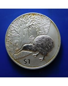 New Zealand  Dollar 2013	A kiwi near Tane Mahuta, the biggest kauri tree alive, in the Waipoua Forest of Northland Region, New Zealand. – proof /  Silver