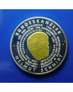 Togo 	 500 Francs	2004	German Cancellor Helmut Schmidt – Gold  plated silver 
