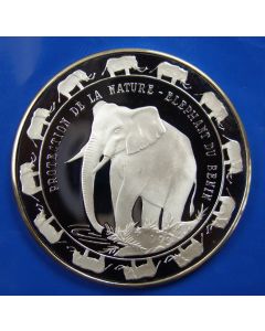 Benin	6000 Francs	1993	Elephant within inner circle, elephants, (trunk to tail) form outet circle - Silver / Proof