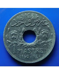 Syria  French Protectorate 	 Piastre	1940	 Rare – Lion Heads around center hole